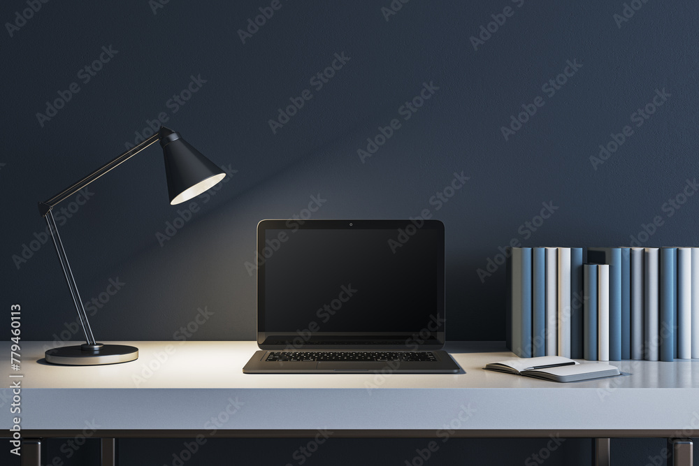 Poster modern concrete workplace with lamp, books and mock up laptop. workspace close up. 3d rendering.