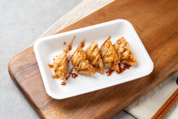 Gopchang, vegetables, stir-fry, sundae, dumplings, fried dumplings, lettuce, radish, ssamjang, pork cutlet, cabbage, chili pepper, garlic, and steamed eggs