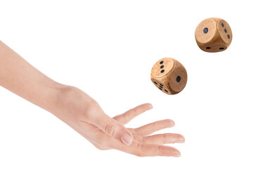 Woman throwing wooden dice on white background, closeup