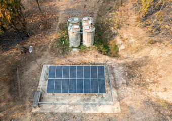 Solar panel for groundwater pump to storage amid drought in rural.