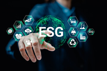 Businesswomen touch symbols with ESG concepts for Environment, Social, Governance, net zero, carbon neutrality goals, development business sustainable environment concept.