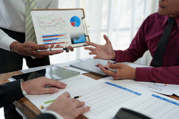 Financial analyst analyzes businessman investment consultant analyzing company financial report...