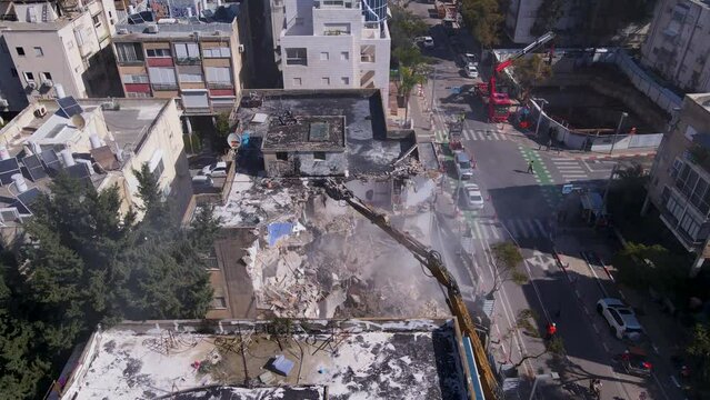 Destruction of buildings by heavy equipment on David Bloch street, Tel Aviv, Israel