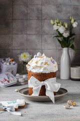 Easter cake decorated with meringue and chocolate eggs