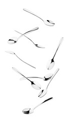 Falling spoon, cutlery on white background, isolated