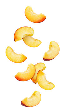 Falling Nectarine or peach, slice, isolated on white background, full depth of field