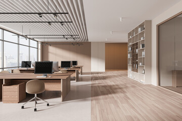 Beige open space office interior with bookcase