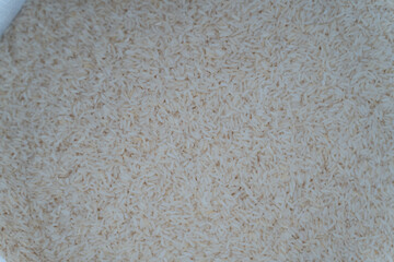Obraz premium white rice grains for texture background abstract background.