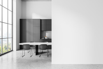 White and gray kitchen with table and blank wall - obrazy, fototapety, plakaty