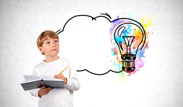 Smart kid take note and look up at colorful lightbulb with copy space bubble