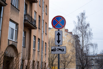 Road signs "Parking prohibited" or "Stopping prohibited" and "Car evacuation" on a city street