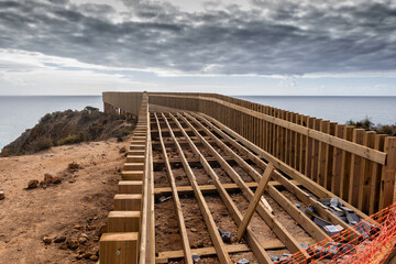 Wooden Boardwalk Under Construction On Algarve Coast - obrazy, fototapety, plakaty