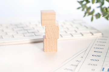 Empty wooden cubes are on the workplace