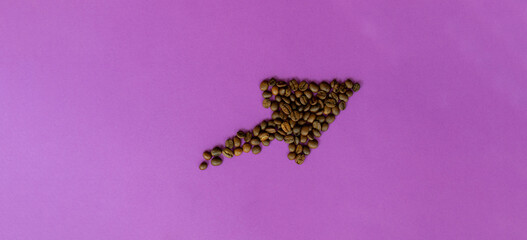 coffee beans laid out in the form of an arrow on a purple background, rising price of coffee, growing consumption,with a place for inscription