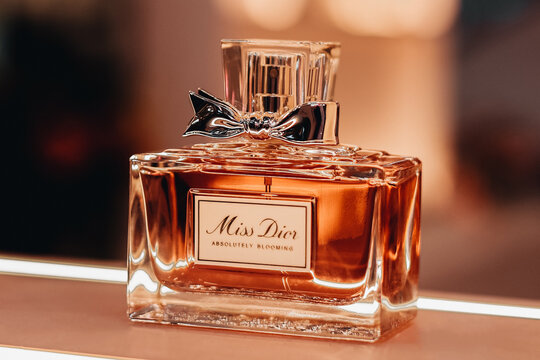 Close up Miss Dior luxury perfume glass bottle on a stand. It was founded in 1946 by French fashion designer Christian Dior.