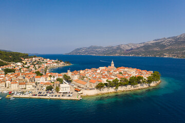 Obraz premium Korcula, Croatia: Aerial drone view of the famous Korcula old town and island, a popular beach vacations destination in the Balkans