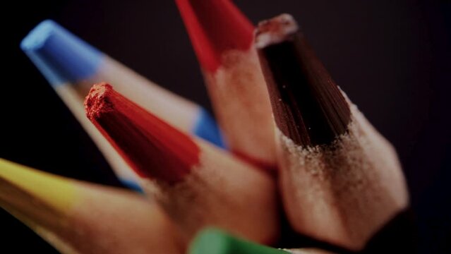 Close-up of colorful pencil tips, vibrant wooden pencils with sharpened edges, symbolizing the intersection of artistic and educational pursuits. HDR, 4K.