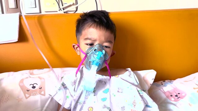 Boy using a ventilator in hospital Symptoms and Care of RSV (Respiratory Syncytial Virus) Health care concept