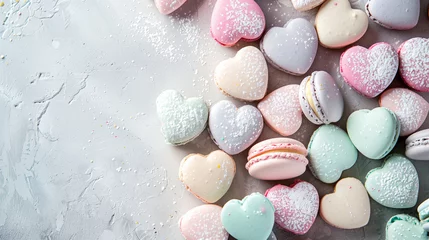 Tuinposter Pastel-colored heart macarons © TY