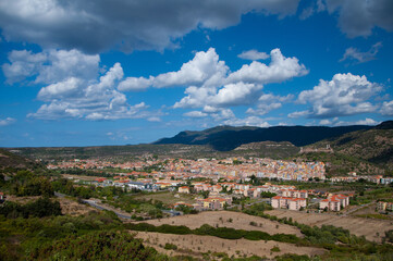 Fototapeta na wymiar Aerial view of Bosa with mountains in the background. Oristano, Sardinia, Italy