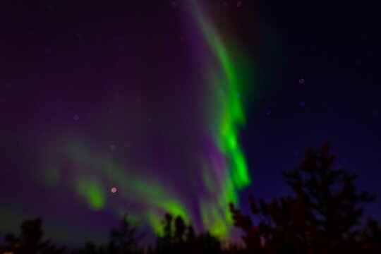 Green neon Aurora Borealis in the sky