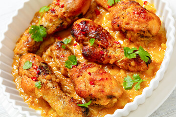 chicken drumsticks in pineapple sauce, top view