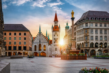 The old town of Munich, Germany, with Town Hall at the Marienplatz Square during a sunrise without people - 779544167