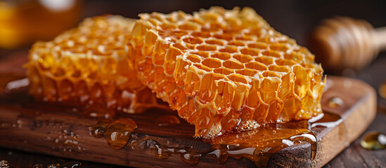 Close up of honey and honeycomb. Healthy and natural food theme.