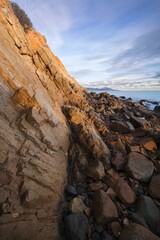 Fototapeta na wymiar Vertical shot of the rocky coast Townsville, north-eastern coast of Queensland, Australia