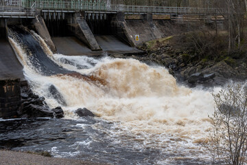 water flowing over the dam