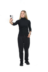 front view of a woman taking a selfie on white background - 779568351