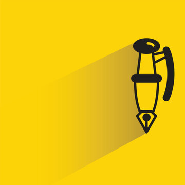 fountain pen icon with shadow on yellow background