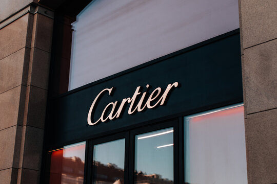 Cartier logotype at facade entrance to the famous boutique fine jewelry watches bridal sets shop accessories and fragrances store in Moscow city