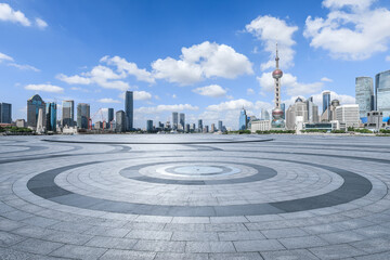 Round square floor and city skyline with modern buildings in Shanghai