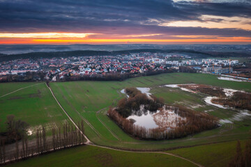 Amazing sunset over the wet spring fields in Poland - obrazy, fototapety, plakaty