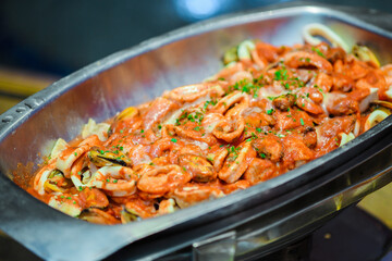 Closeup of Seafood Fra Diavolo in a metal container