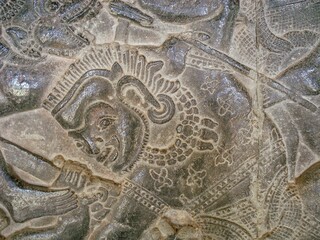 Image of an engraving of a battle of Lanka on a stone in Angkor Wat, Cambodia