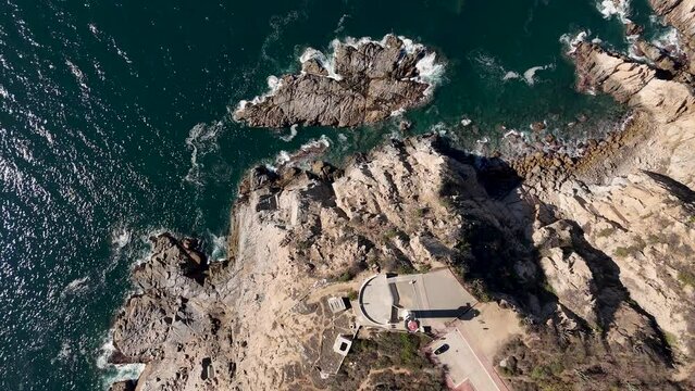 Drone's eye view of La Bufadora and the Lighthouse in Huatulco, Oaxaca, Mexico