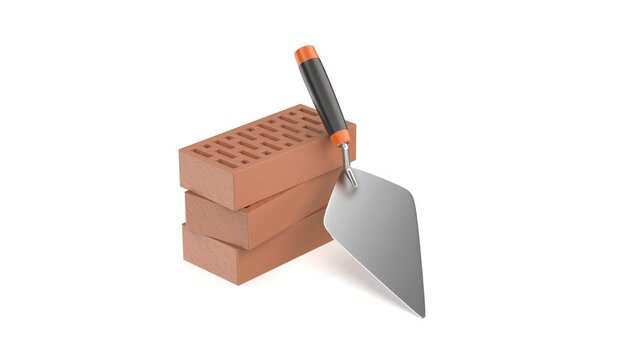 Trowel and bricks on white background