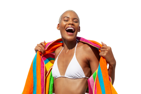 Happy laughing woman wrapped in a colorful towel, African latin American woman isolated on white background. Concept of summer beach holiday or booking travel and resort accommodations or for shopping