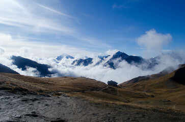 alps mountains in the clouds