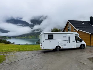 Foto op Canvas Motorhome camper in a campsite near Briksdal glacier, south Norway. Europe © Alberto Gonzalez 