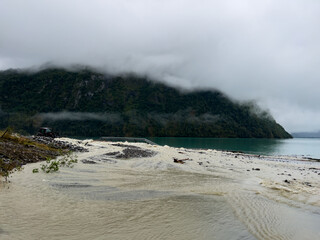Briksdal, Norway; September 11 2023: River Flooding Spills onto Road Near Briksdal Valley, Norway