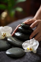person enjoys a hot stone massage, with warm stones strategically placed along their spine