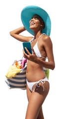 Happy woman at the beach wearing sun hat and bikini, holding beach bag and using mobile phone, isolated on white background. Concept of summer beach holiday, shopping online, booking travel and resort