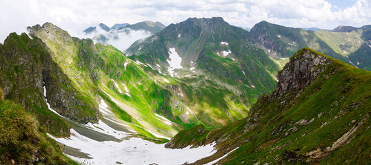spectacular view from above of a valley in fagaras mountains. mountainous landscape of romania in summer. popular travel destination - 779648517