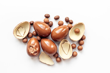 Chocolate eggs and sweets flat lay. Chocolates background