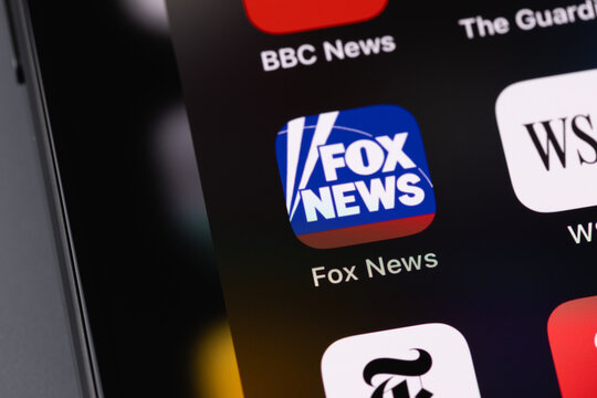 Fox News logo mobile app icon on a screen smartphone, iPhone closeup. Fox News is an American basic cable and satellite television news channel. Batumi, Georgia - December 22, 2023