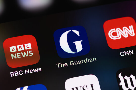The Guardian logo mobile app icon on a screen smartphone, iPhone closeup. The Guardian is a left-liberal daily newspaper in the UK. Batumi, Georgia - December 22, 2023