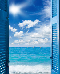 room with open blue door to seascape - vacation concept